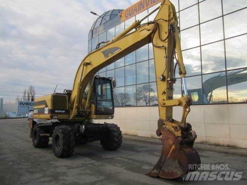 CAT M315 حفارات بعجل