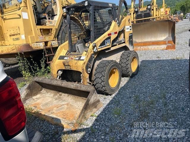 CAT 248 لوادر انزلاقية التوجيه