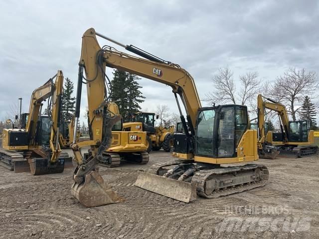 CAT 310 حفارات زحافة