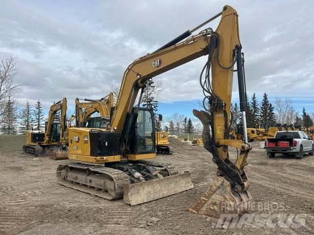CAT 310 حفارات زحافة