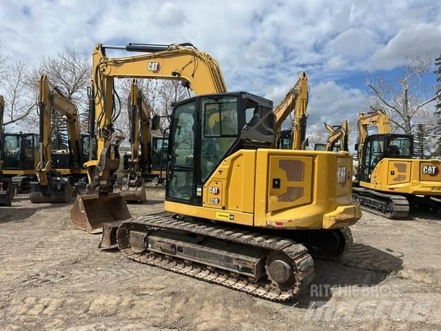 CAT 310 حفارات زحافة