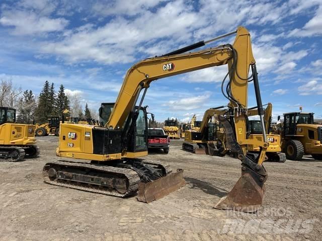 CAT 310 حفارات زحافة