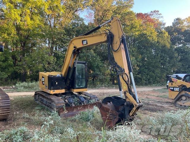 CAT 310 حفارات زحافة