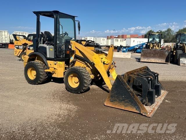 CAT 903C2 لوادر بعجل