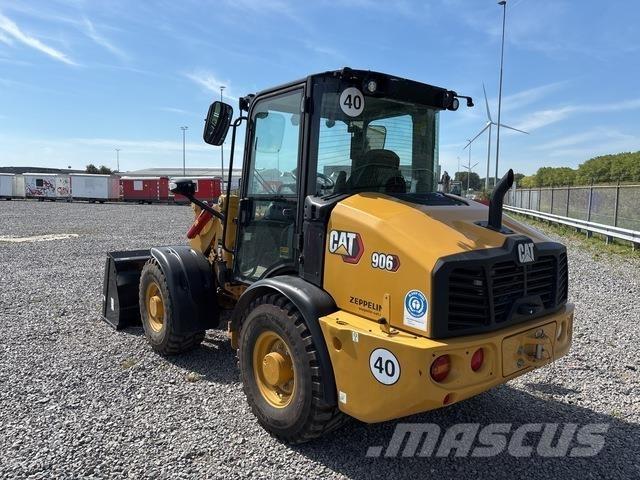 CAT 906 لوادر بعجل