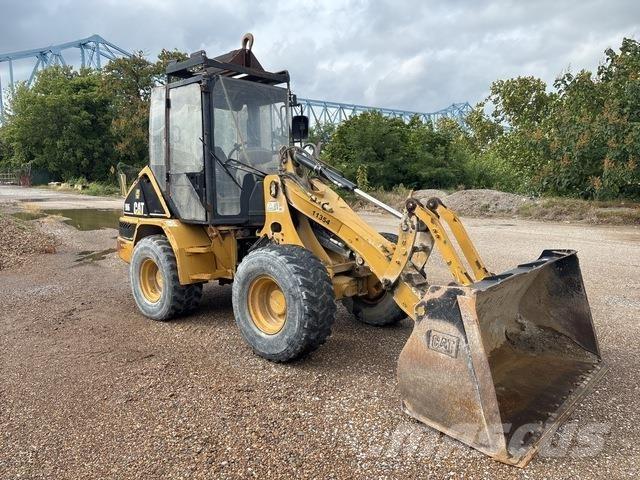 CAT 906 لوادر بعجل