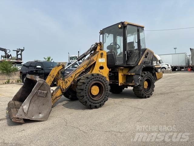 CAT 908 لوادر بعجل