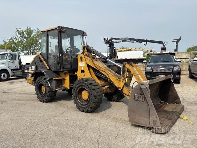 CAT 908 لوادر بعجل