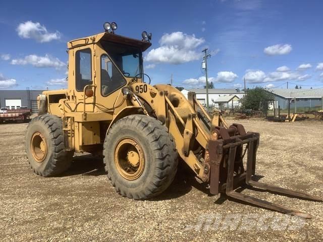 CAT 950 لوادر بعجل