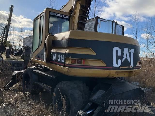 CAT M315 حفارات بعجل