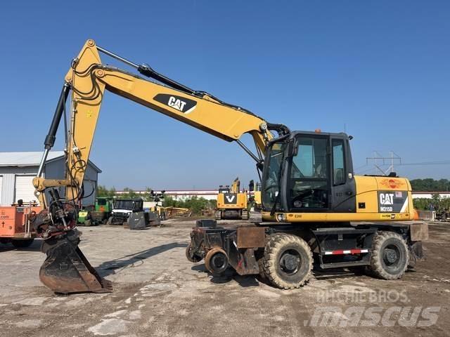 CAT M315D حفارات بعجل