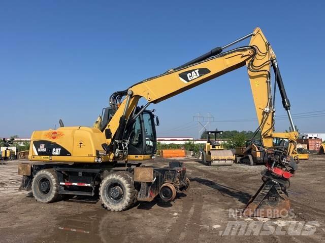 CAT M315D حفارات بعجل