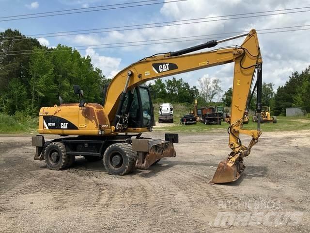 CAT M316D حفارات بعجل