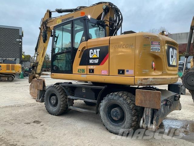 CAT M316F حفارات بعجل