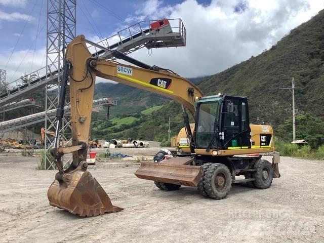 CAT M317D2 حفارات بعجل