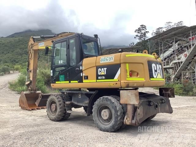 CAT M317D2 حفارات بعجل