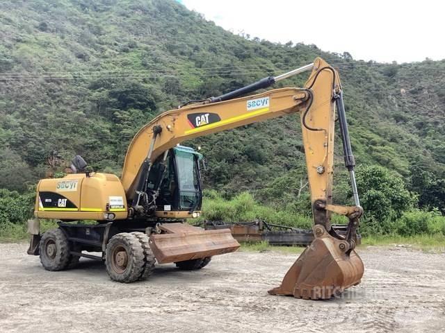 CAT M317D2 حفارات بعجل