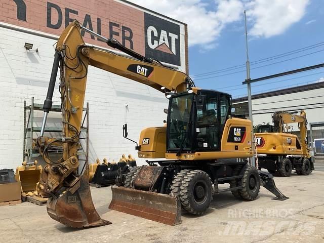 CAT M317F حفارات بعجل