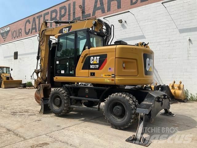 CAT M317F حفارات بعجل