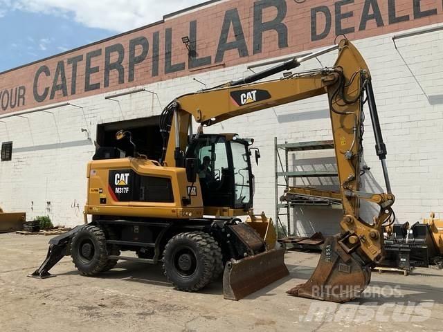 CAT M317F حفارات بعجل