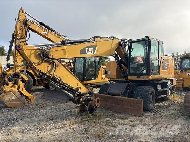 CAT M318F حفارات بعجل