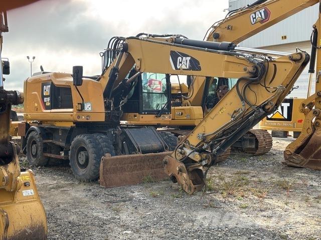 CAT M318F حفارات بعجل