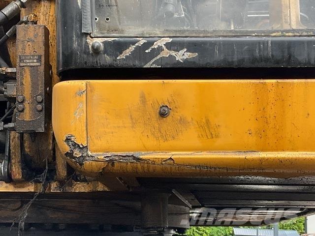 CAT M320 حفارات بعجل