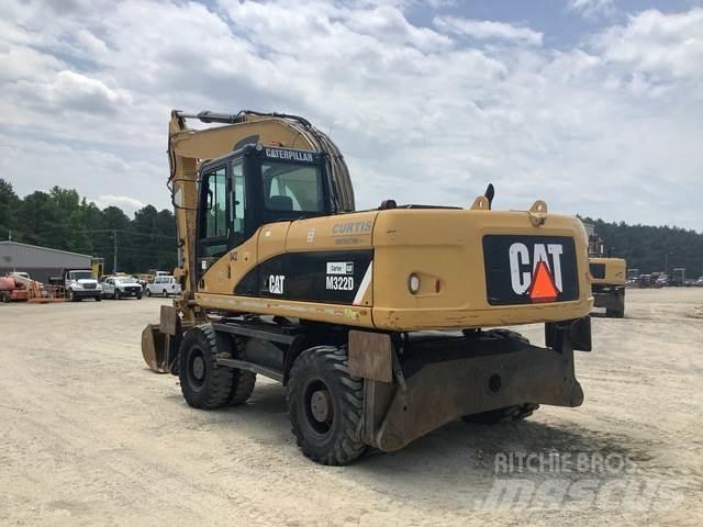 CAT M322D حفارات بعجل