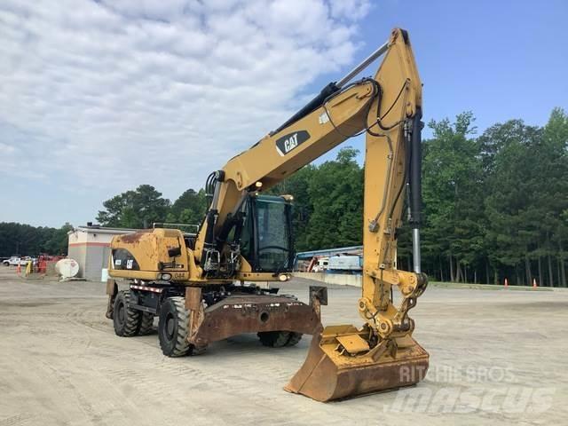 CAT M322D حفارات بعجل