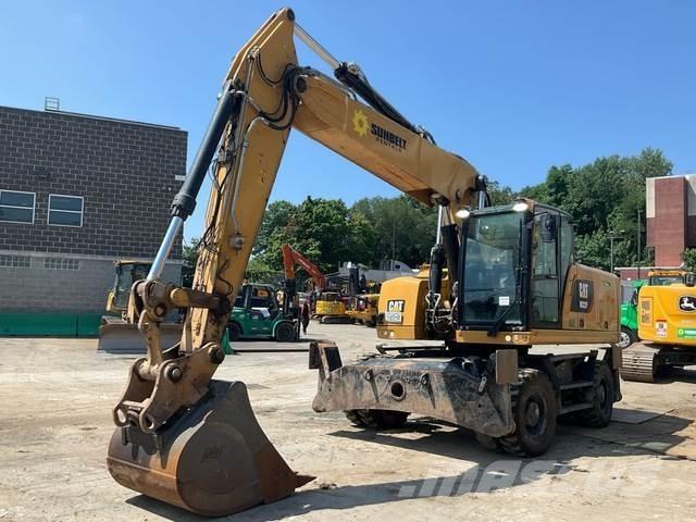 CAT M322F حفارات بعجل