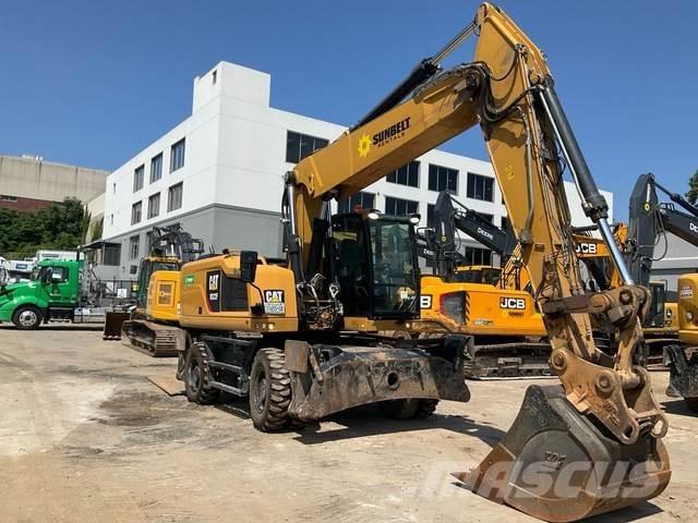 CAT M322F حفارات بعجل