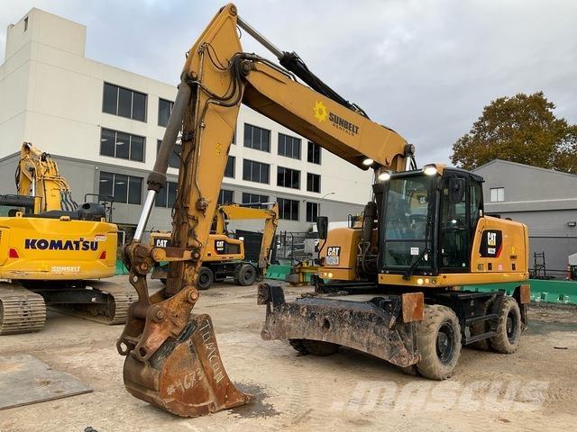 CAT M322F حفارات بعجل