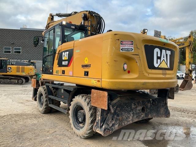 CAT M322F حفارات بعجل
