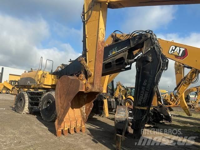 CAT M325CMH لوادر بذراع مفصلي