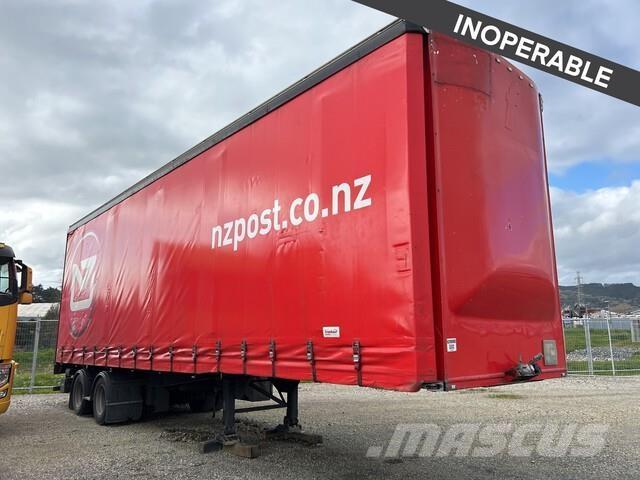 Fruehauf  مقطورات بغطاء جانبي