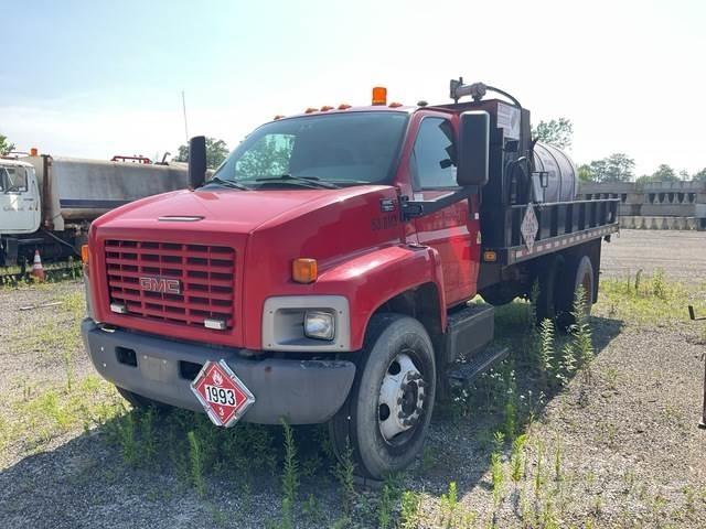 GMC 7500 شاحنات مسطحة/مفصلية الجوانب