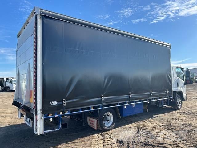 Isuzu FRR 600 شاحنات بغطاء جانبي