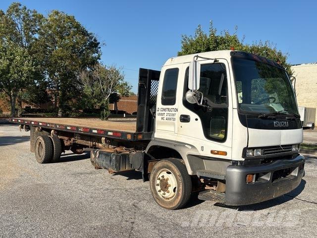 Isuzu FTR شاحنات مسطحة/مفصلية الجوانب