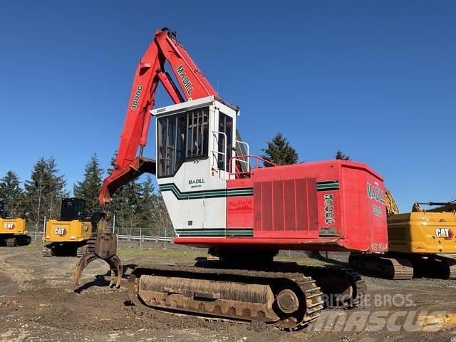 Madill 3800C لوادر بذراع مفصلي