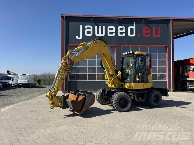 Komatsu PW98 MR10 حفارات بعجل