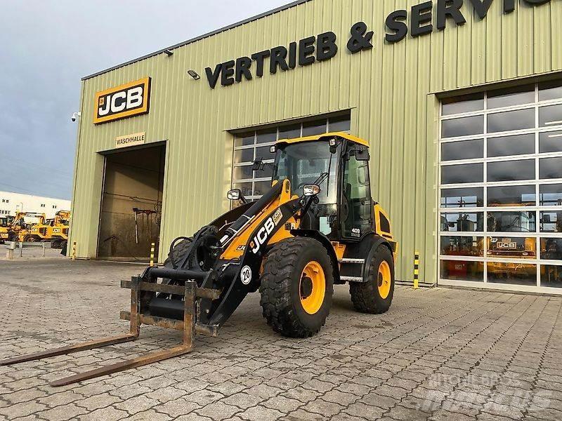 JCB 409 لوادر بعجل