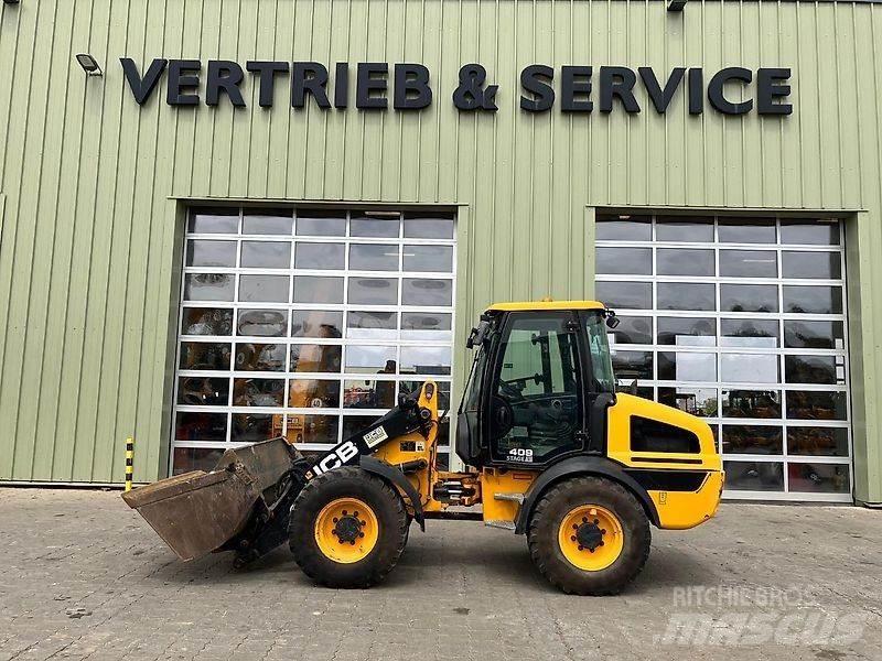JCB 409 لوادر بعجل