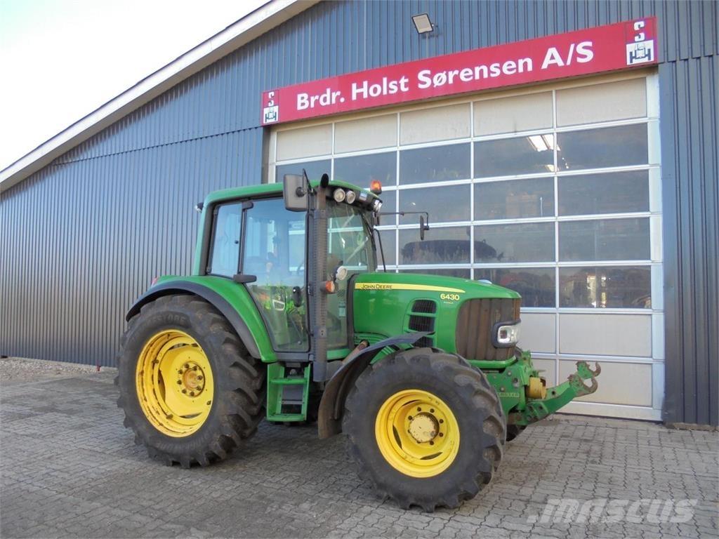 John Deere 6430 الجرارات