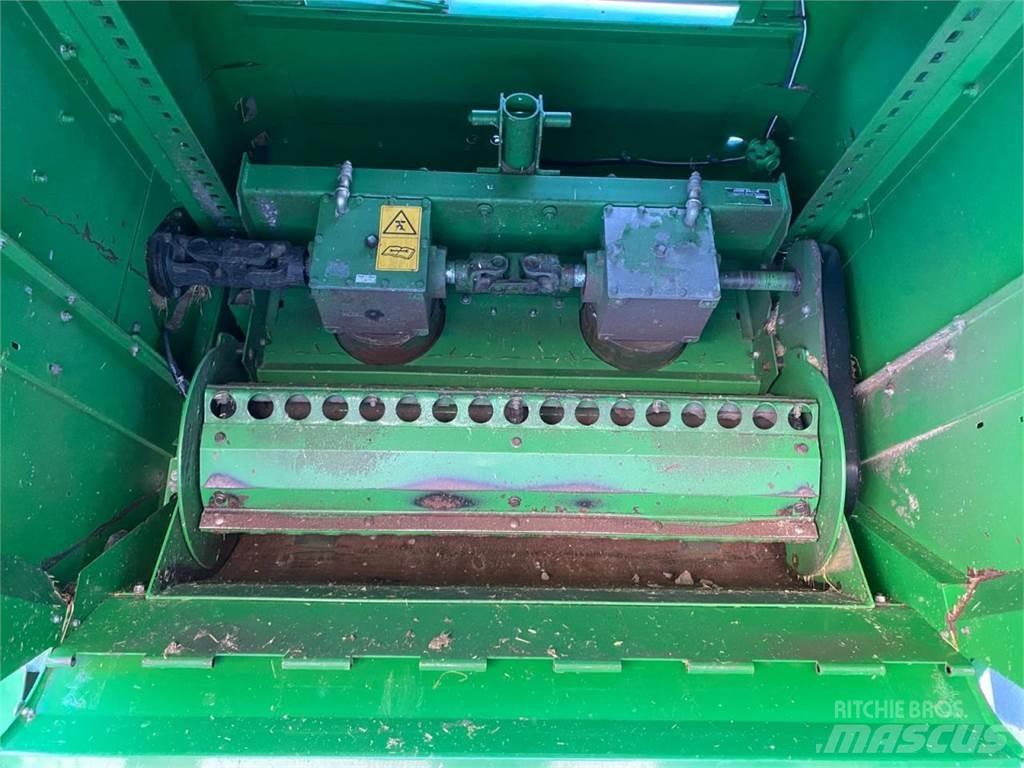 John Deere C670 حصادات