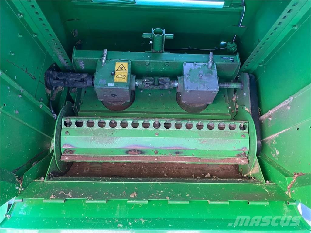 John Deere C670 حصادات