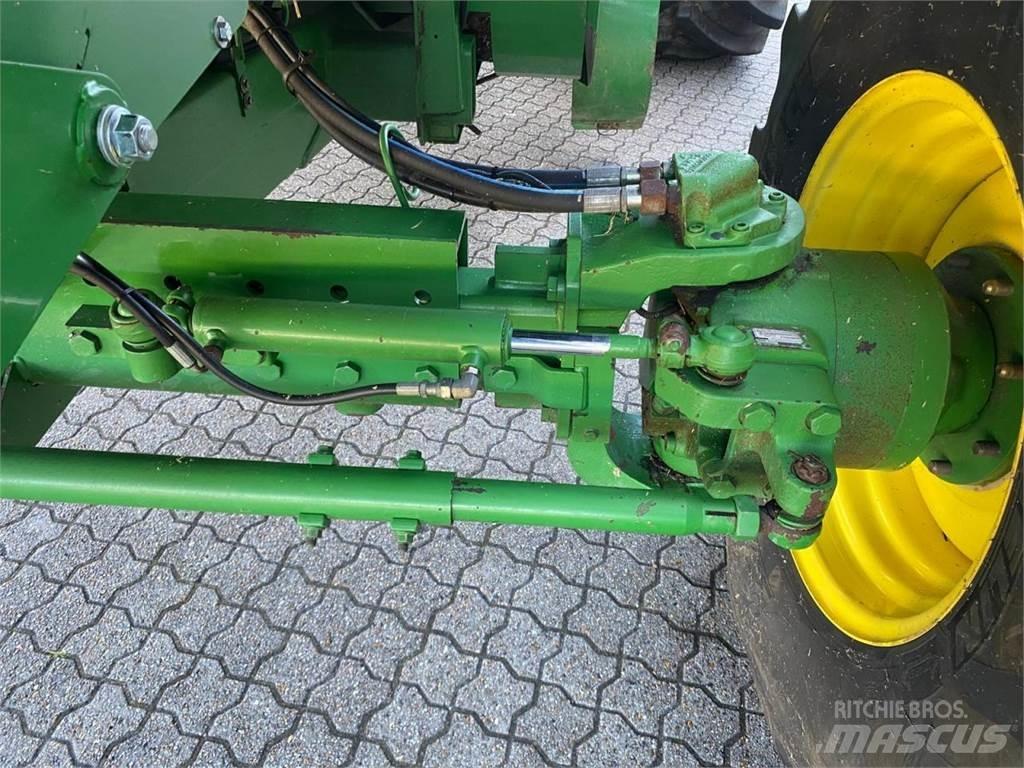 John Deere C670 حصادات