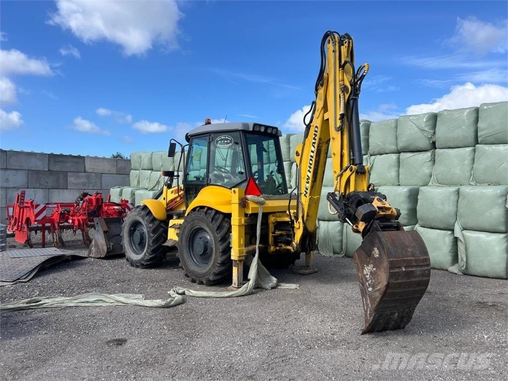 New Holland  لوادر ذات جرافات عكسية