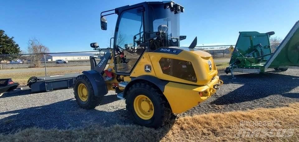 John Deere 304 G لوادر صغيرة