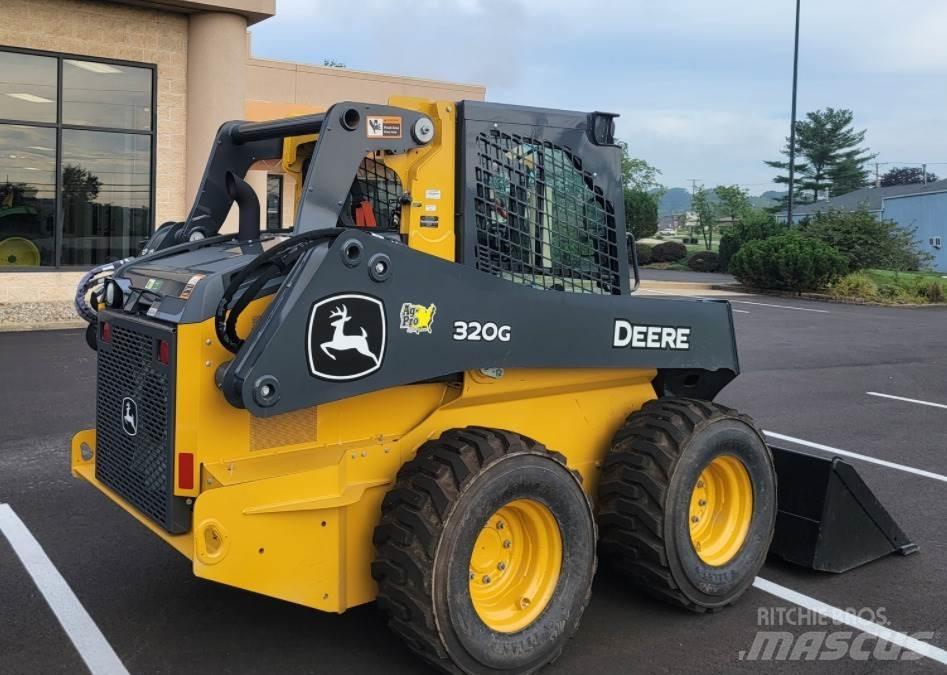 John Deere 320G لوادر انزلاقية التوجيه