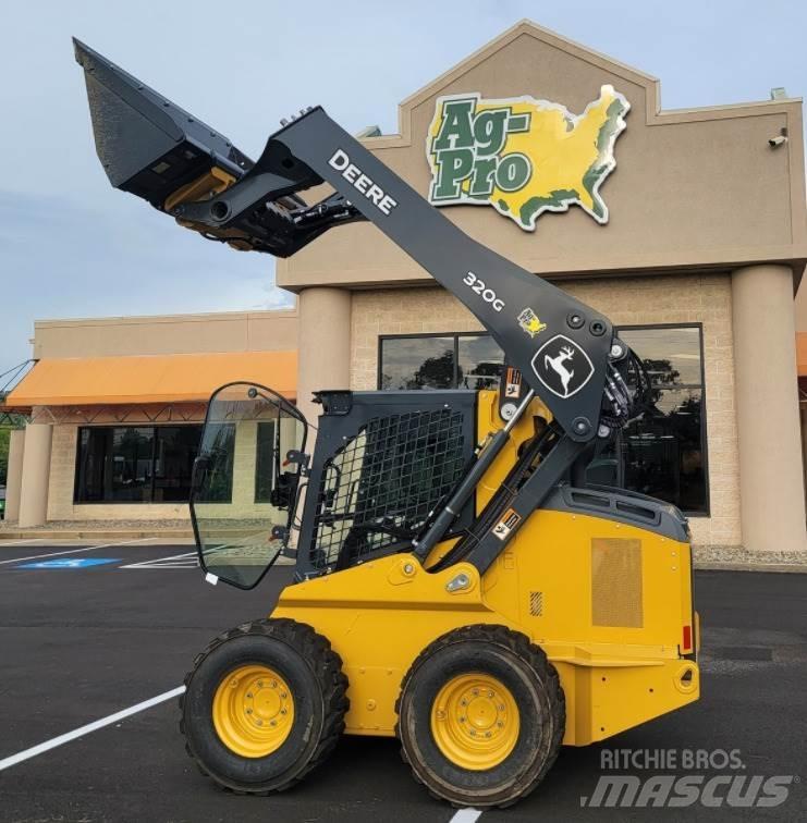 John Deere 320G لوادر انزلاقية التوجيه